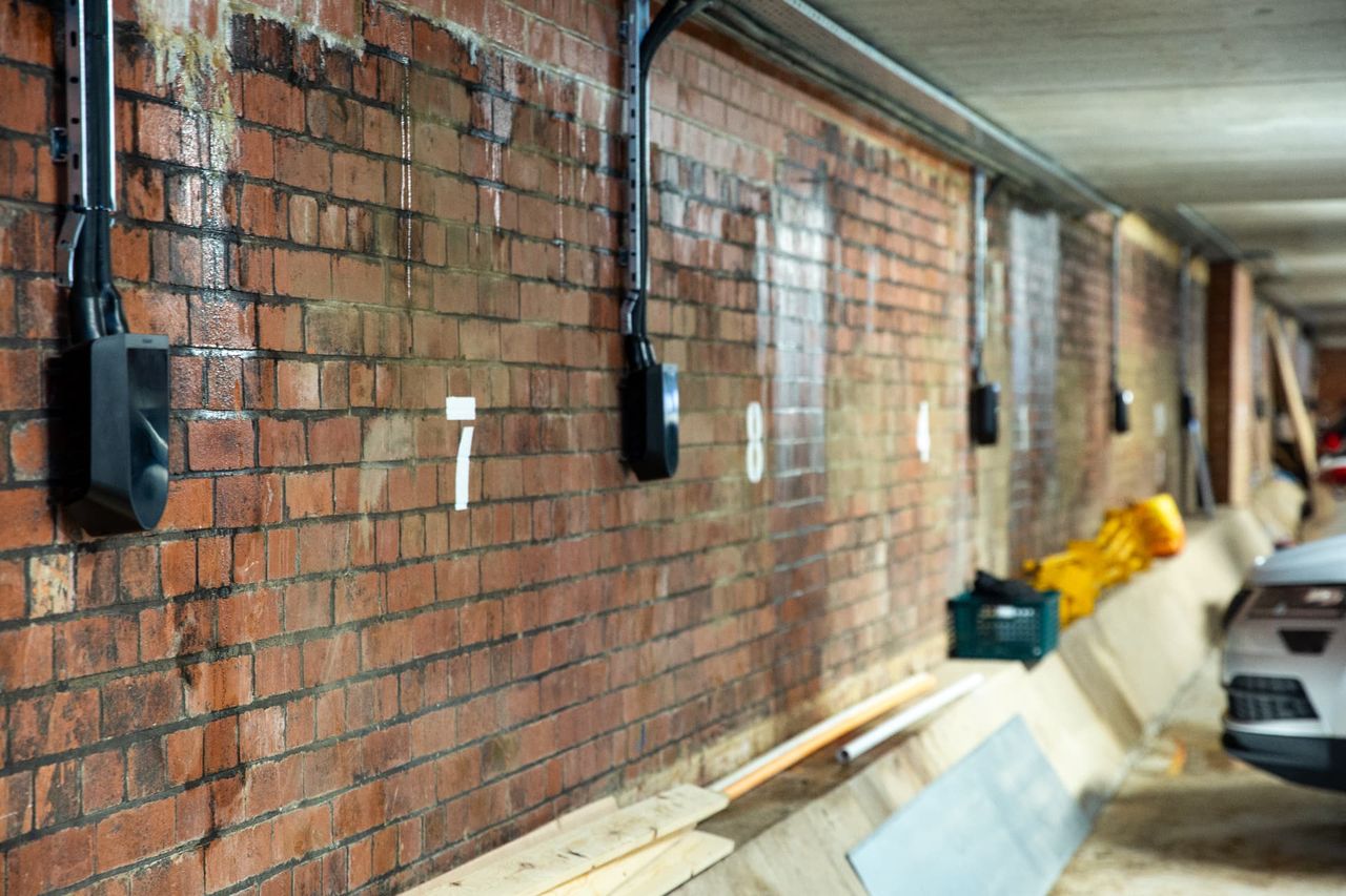 Wall-mounted EV chargers installed by Bambridge Electrical